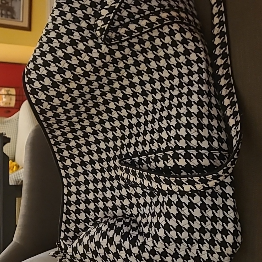 Vera bradley weekender with one outside pocket.  About 20 long 10 inches wide